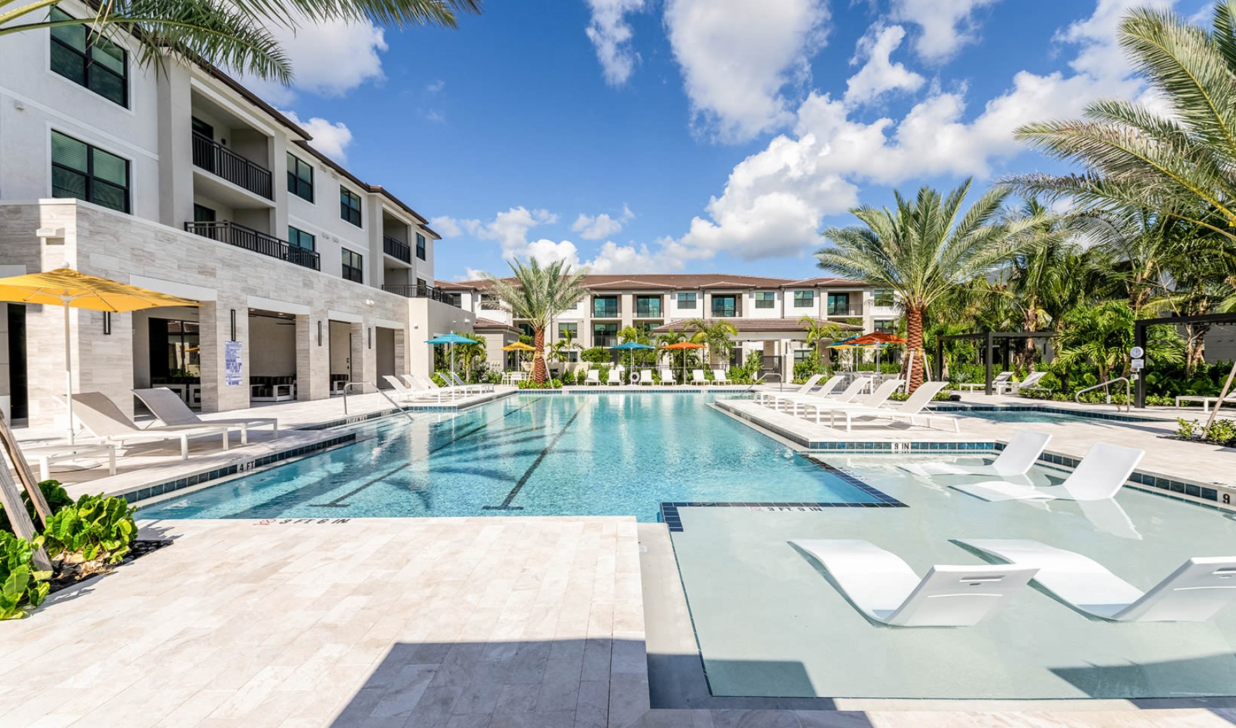 swimming pool with tanning shelf